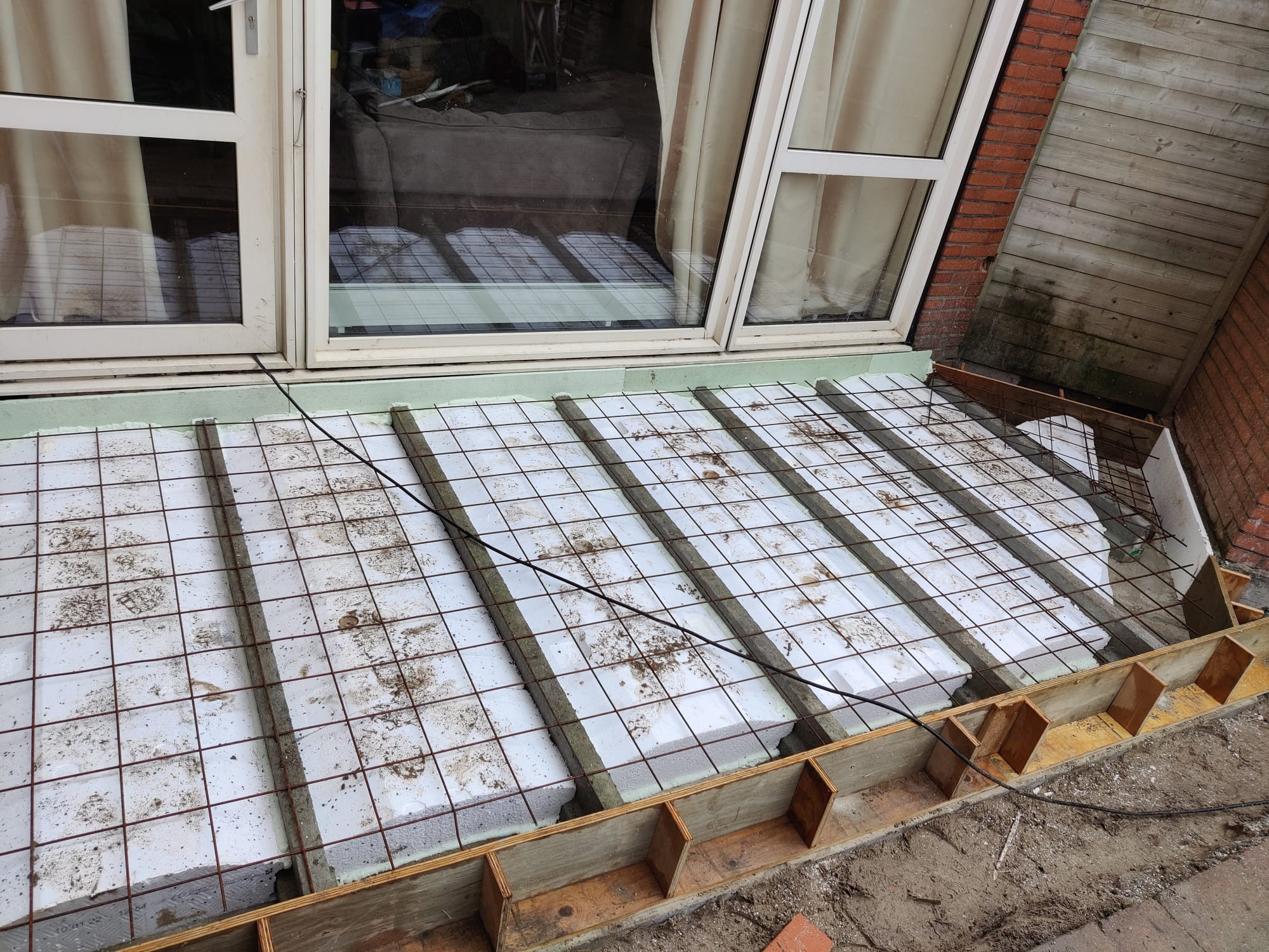 Aanbouw met Openslaande Deuren · tijdens